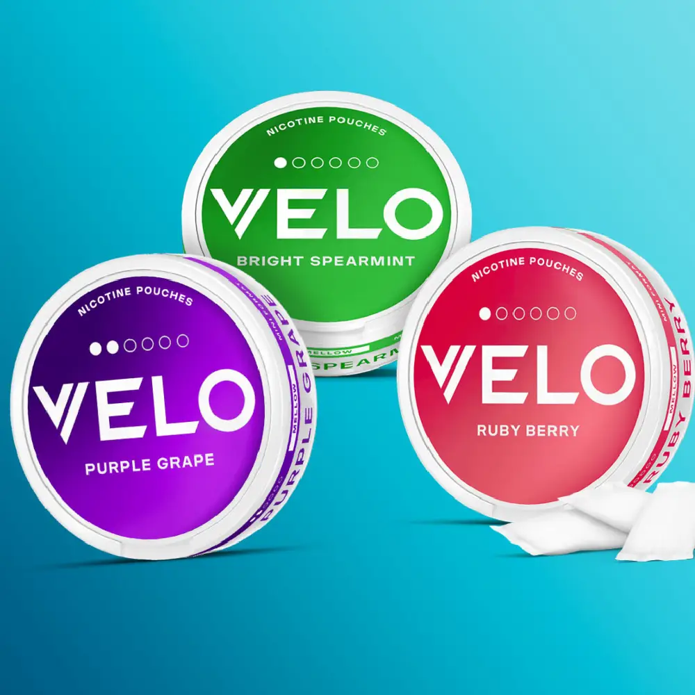 VELO nicotine pouch cans — Bright Spearmint, Purple Grape and Ruby Berry